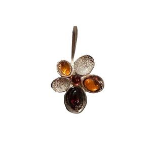 Polish genuine amber flower shaped necklace pendant.
